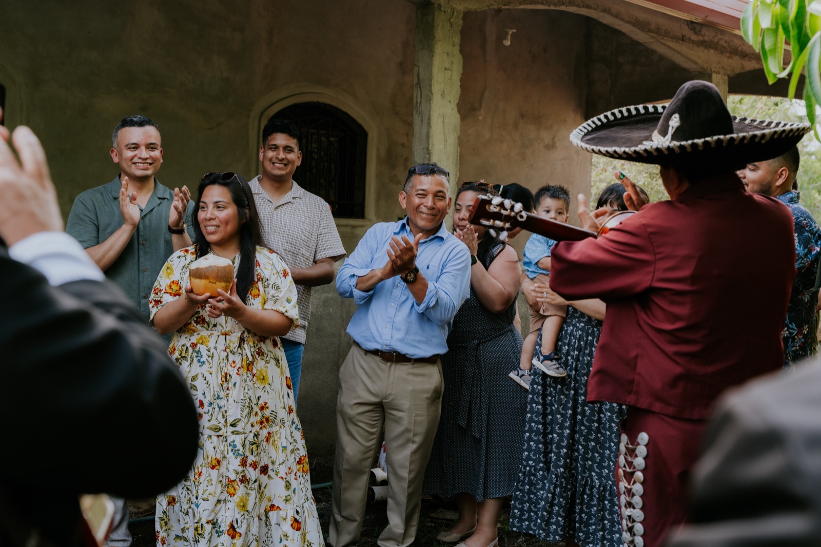 Family celebrating together with live mariachi music